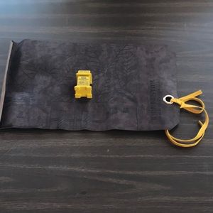 Drew Estate swag accessories- cigar rest and leather pouch